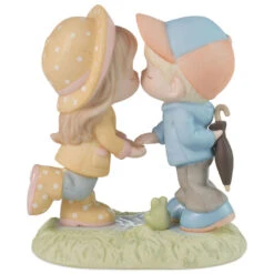Precious Moments You Are My Sunshine On A Rainy Day Figurine, 5.6" 9 Precious Moments You Are My Sunshine On A Rainy Day Figurine, 5.6" -Hallmark Shop Precious Moments Couple Kissing in the Rain Figurine 223002 04